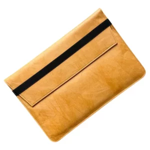 Minimalist Tyvek laptop sleeve with black elastic strap closure